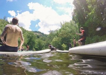 Ready for the perfect hangover cure? Paddleboard in the mountains outside of Porto.